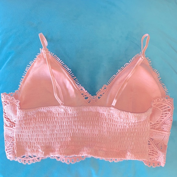 Pink lace crop top with adjustable straps and removable pads. - Picture 2 of 3